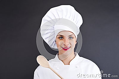 Woman cheff over dark backgrund Stock Photo