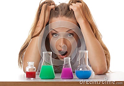 Woman chemist and chemicals in flasks Stock Photo