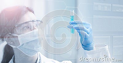 Woman chemist holding a test tube Stock Photo