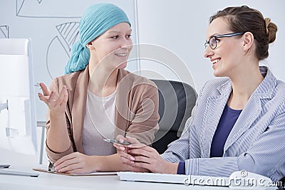 Woman after chemo at work Stock Photo