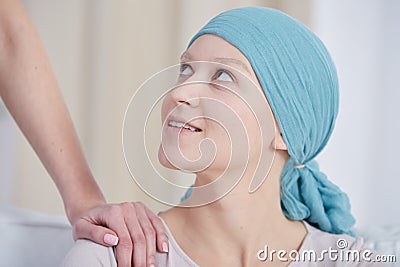 Woman after chemotherapy wearing headscarf Stock Photo