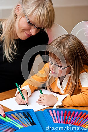 Woman and child drawing Stock Photo