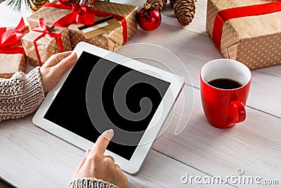 Woman christmas shopping online with a credit card Stock Photo