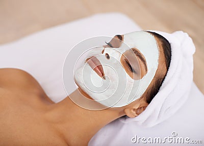 Woman, clay mask and facial for skincare in spa, detox and cosmetic treatment for beauty or health. Person, relax or Stock Photo