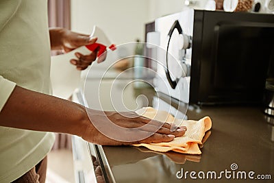 Woman Cleaning Kitchen Counters Closeup Stock Photo