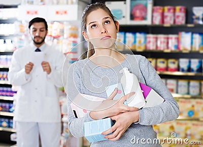 Woman client who is dissatisfied of recommended medicines Stock Photo