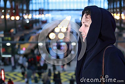 Woman close up stands in train station Stock Photo