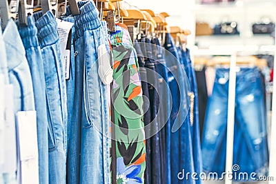 Woman clothes in the store. Fashion store. Shopping mall. Stock Photo