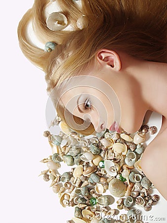 woman with cockleshell in her hair Stock Photo