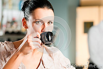 Woman in a coffeeshop Stock Photo