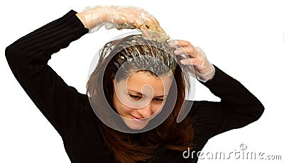 Woman coloring her hair Stock Photo