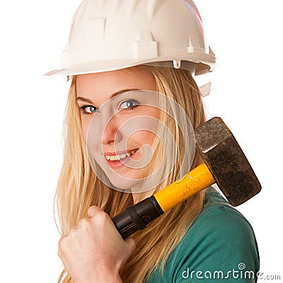 Woman with constructor helmet and hammer happy to do tough work. Stock Photo