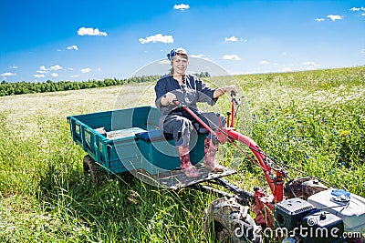 Woman controls the tiller Stock Photo