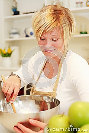 Woman cooking Stock Photo