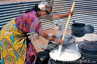 A woman cooking in South Africa Editorial Stock Photo