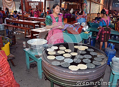 Woman cooking tortillas Editorial Stock Photo