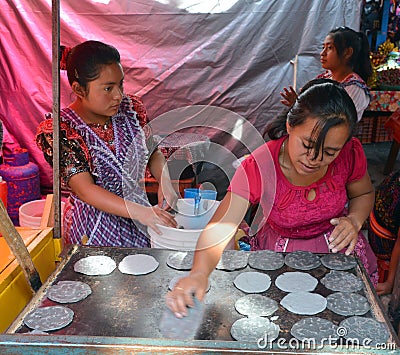 Woman cooking tortillas Editorial Stock Photo