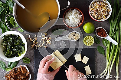 Woman is cooking traditional miso soup Stock Photo