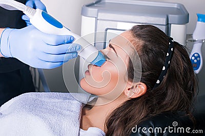 Woman cosmetic face fractional treatment Stock Photo