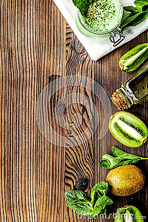 Woman cosmetic set with kiwi scrub table background top view mock up Stock Photo