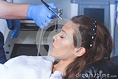 Woman cosmetics hydration face treatment Stock Photo