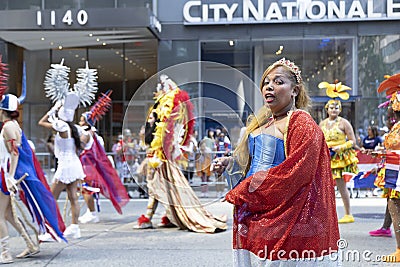 A woman in a costume during the Dominican Day Parade Editorial Stock Photo