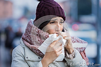 Woman coughing in winter Stock Photo