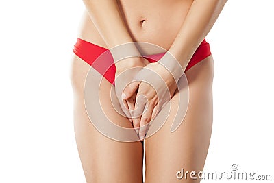 Woman covering her crotch Stock Photo