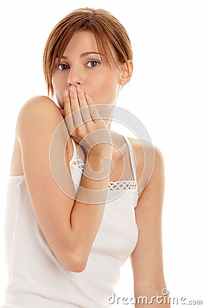 Woman covering mouth Stock Photo