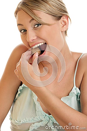 Woman cracking walnut Stock Photo