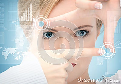 Woman creating frame with fingers Stock Photo