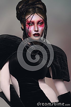 Woman with creative red make-up Stock Photo