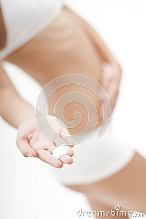 Woman with creme on her hand Stock Photo