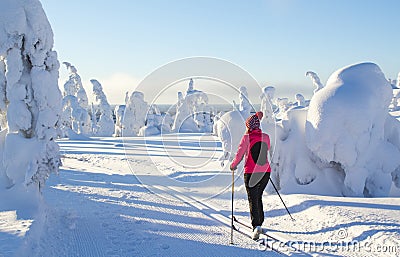 Woman cross country skiing Stock Photo