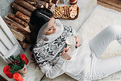 Woman with cup of cocoa with marshmallow on christmas Stock Photo