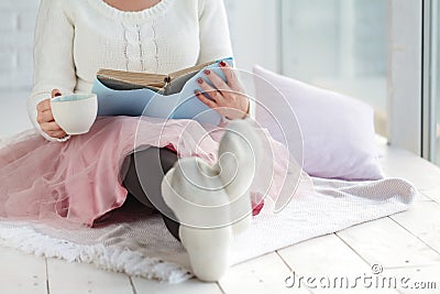 Woman with Cup tea Rest Plaid, Foot with White Socks Stock Photo