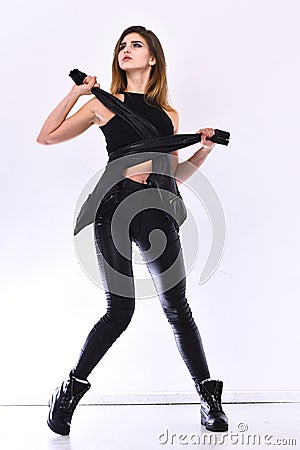 Woman with curious face and brutal style on white background Stock Photo