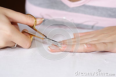 Woman cutting nails Stock Photo
