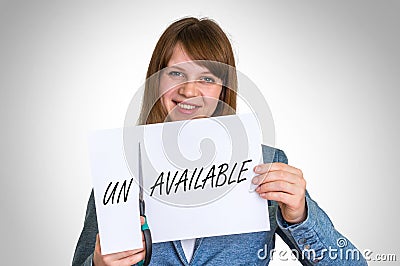 Woman cutting paper by scissors with unavailable word Stock Photo