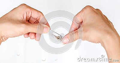 Woman cutting thumb nail on right hand. Stock Photo