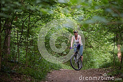 Woman is cycling Stock Photo