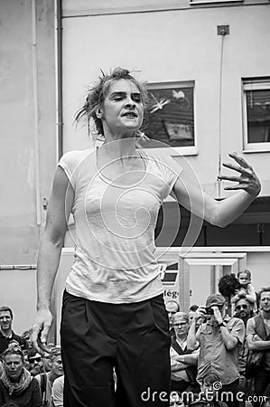 Woman dancing performance of modern jazz in the street Editorial Stock Photo