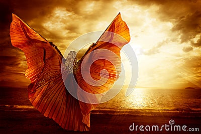 Woman Dancing Wings Dress, Fashion Art Model Flying on Ocean Sky Stock Photo