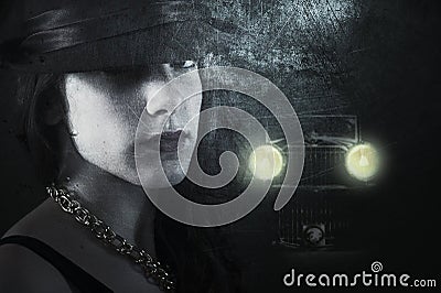 Woman in a dark street Stock Photo