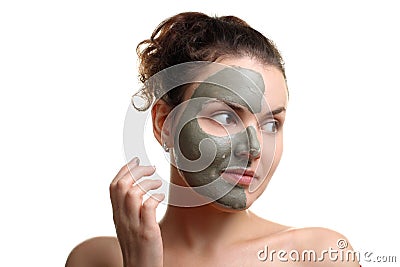 Woman deals on the face mask Stock Photo