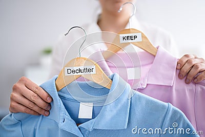 Woman Decluttering Clothes, Sorting Stock Photo