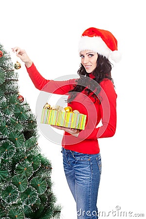 Woman decorating artifical fur tree Stock Photo