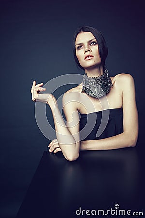 Woman in decorative silver necklace Stock Photo