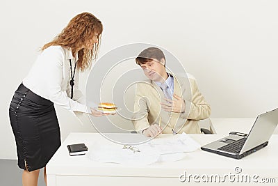 Woman delivered to chief a sandwich to dinner Stock Photo