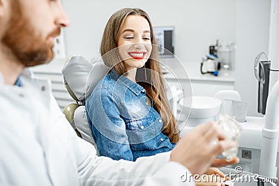 Woman during the dental consultation Stock Photo